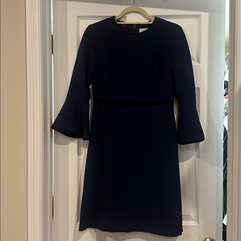 Eliza J Midnight Blue Dress with Bell Sleeves and Black trim detail.